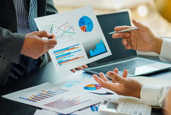 business people reviewing tax