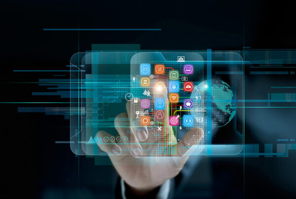 abstract image of hand touching apps on smartphone screen on dark background