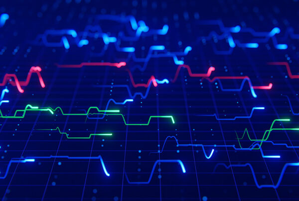abstract image of financial charts with red, green, blue lines on dark blue background