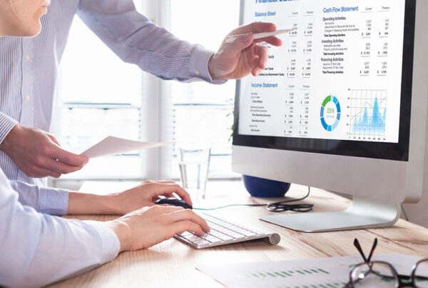 Two finance professionals viewing Sage Intacct Marketplace