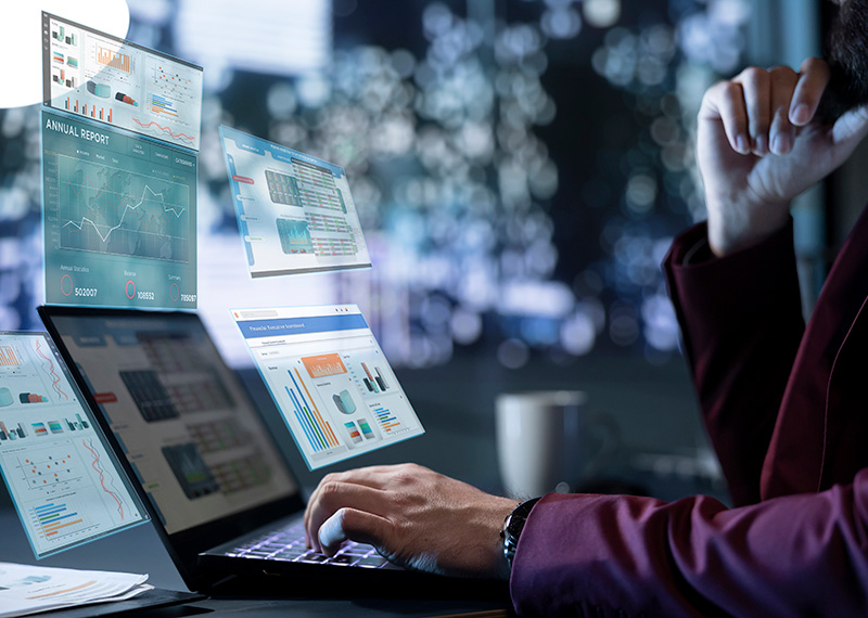 business man reviewing retention and churn rate calculation charts