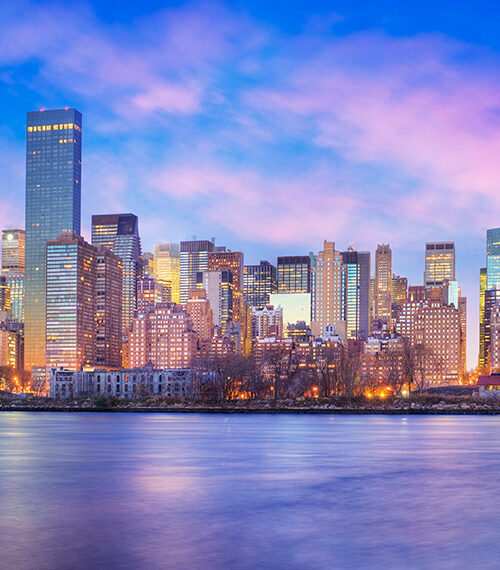View of Manhattan at dusk site of the F-Suite CFO Scale Up Summit 2025