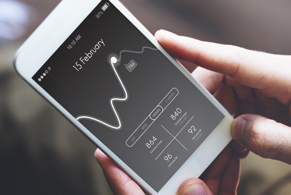 mobile phone with usage pattern displayed on screen and invoice charges below