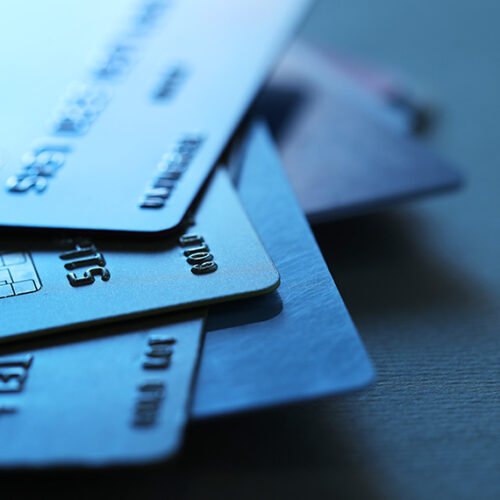 close up view of stack of credit cards on a table