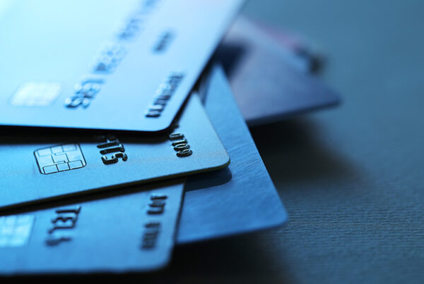close up view of stack of credit cards on a table
