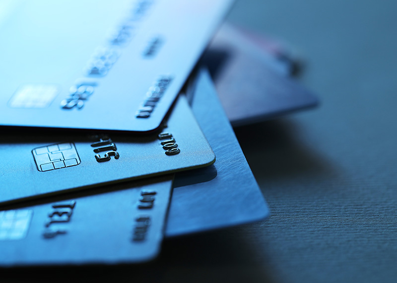 close up view of stack of credit cards on a table