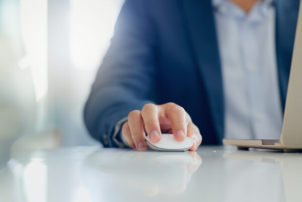 business man clicking free trial for plg saas product