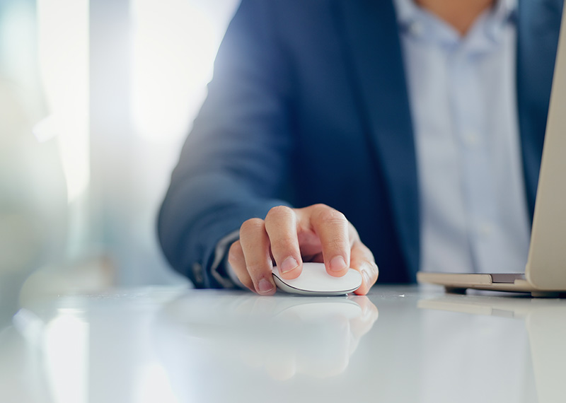 business man clicking free trial for plg saas product