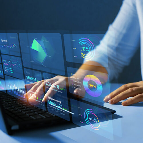 business woman viewing BACS payment transactions on a virtual screen