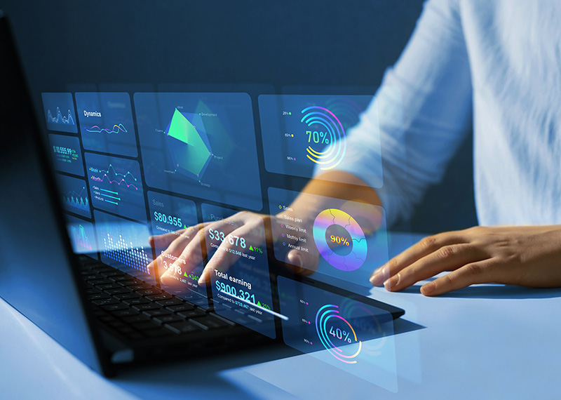 business woman viewing BACS payment transactions on a virtual screen