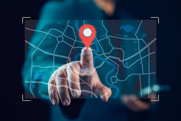 business man pointing to holographic map with finger on billing address