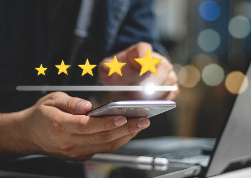 customer giving G2 five star customer review for subscription billing on mobile phone