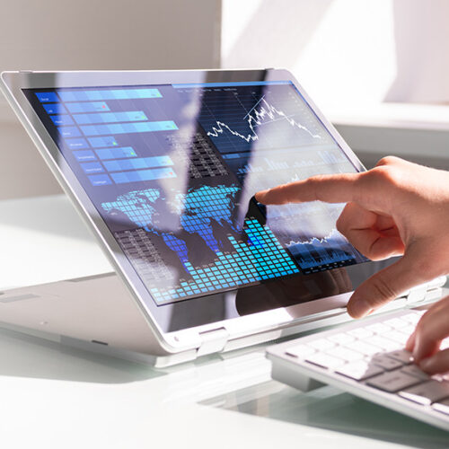 finance manager viewing sepa direct debit transactions on banking portal tablet