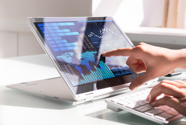 finance manager viewing sepa direct debit transactions on banking portal tablet