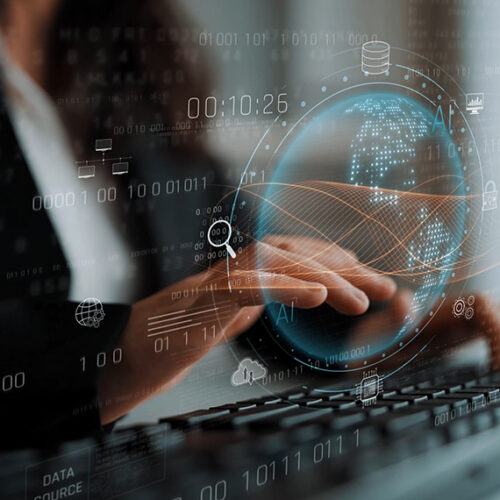 business woman typing at computer with rollover credit balance showing in foreground