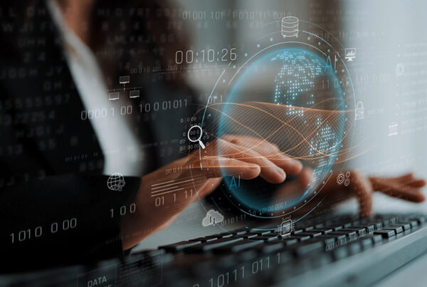 business woman typing at computer with rollover credit balance showing in foreground