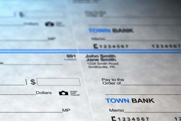 multiple checks ready for deposit in bank lockbox