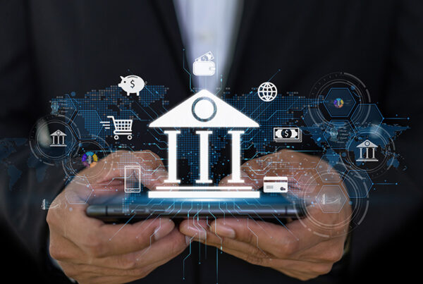 business man holding tablet with bank and faster payments illustration