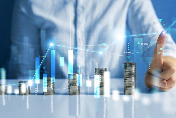 business man with reporting currency chart in front of him