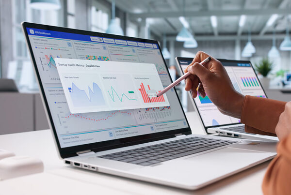 finance leader viewing electronic bank account statements on laptop
