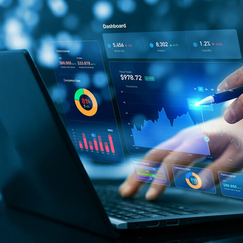founder typing laptop with revenue sharing financial dashboard in foreground
